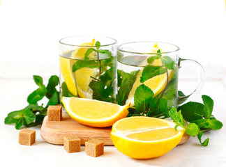 Fototapeta premium Two Cups of Mint tea on white background.