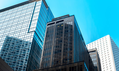 Fototapeta na wymiar Bottom up view of Hong Kong Commercial buildings