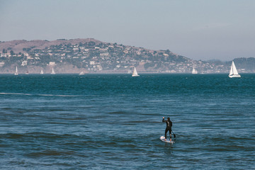 Obraz premium Surf man at San Francisco, California, USA. 