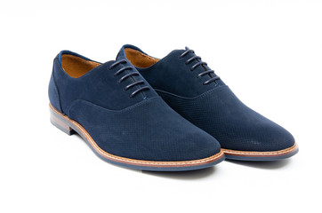 Blue suede shoes isolated on white background