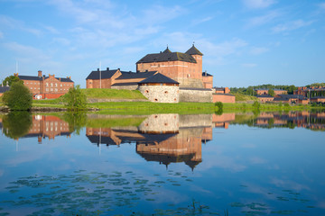 Naklejka na ściany i meble View of the ancient fortress of the Hameenlinna city on a sunny July morning. Finland