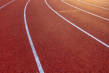 Red running track in stadium