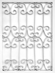 Beautiful decorative metal elements forged wrought iron gates, ornate wrought-iron elements of metal gate decoration, Beautiful decorative pattern metal wrought fence white color.
