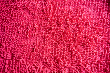 pink color hairy fur textured carpet mat wallpaper background