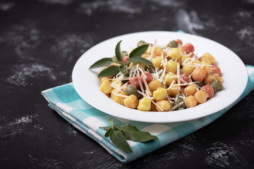 Classic italian lunch with Gnocchi with sage, butter and Parmesa