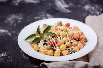 Classic italian lunch with Gnocchi with sage, butter and Parmesa