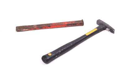 Cold chisel and hammer isolated