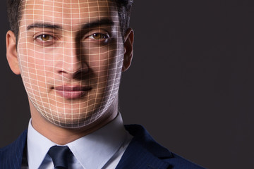 Face recognition concept with businessman portrait