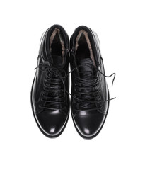 black men's shoes on a black isolated background