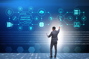 Businessman pressing virtual button in quantum computing concept