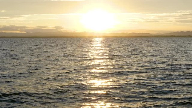The sun sky and the river moving in the moment of Sunrise, nature video background..