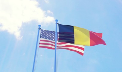 USA and Belgium, two flags waving against blue sky. 3d image