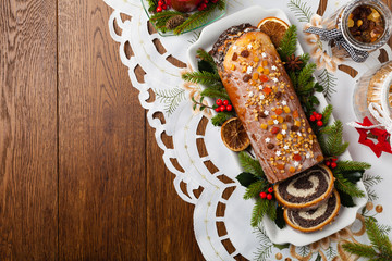 Poppy seed roulade in Christmas decoration. Served with coffee or tea.