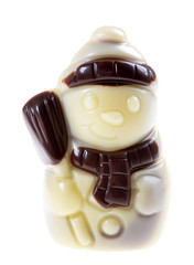 White chocolate figurine snowman on an isolated white background