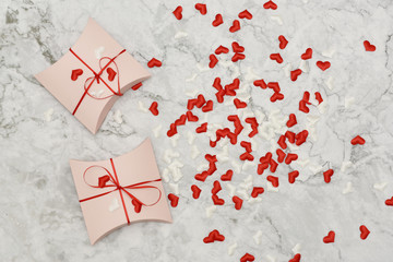 Beautiful valentines day paper hearts on marble background. romantic background greeting card, box, strips and hearts.