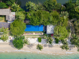 Aerial View: Pool near the Beach in Tropical Island Resort.