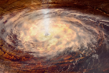 Hurricane over the sandy desert. Collage. The elements of this image furnished by NASA.