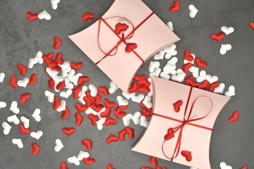 Beautiful valentines day gift box on marble background. romantic background greeting card, box, strips. space for text