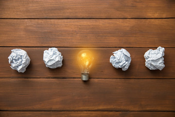 light bulb  with papers