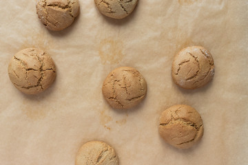 Homemade oatmeal cookies on kraft baking paper