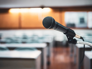 Microphone in Conference Seminar room Meeting Event Background