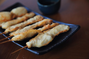 Kushikatsu Japanese fried on wooden table