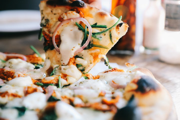 Tandoori Chicken Pizza on wooden table