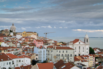 Fototapeta premium Red roofs of old district in Lisbon