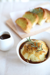Mashed potato with gravy and bread