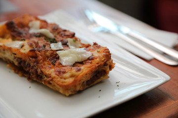 Beef lasagna on wooden background , Italian food