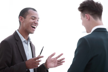 closeup.the businessman and the employee discussing work issues