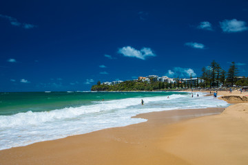 CALOUNDRA, AUS - DEC 28 2018: Hot sunny day at Moffat Beach, Calundra, Queensland, Australia