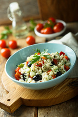 Couscous salad with tomato and olives