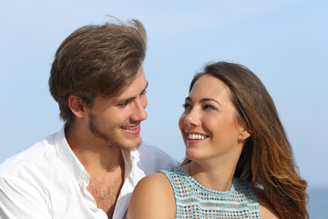 Fototapeta premium Happy couple in love looking each other