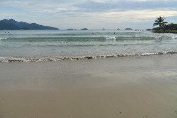 Sand beach with cloudy sky