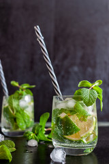 Mojito Cubano or caipirinha cocktail, iced drink with lime and mint