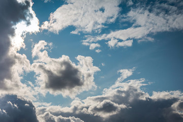 blue sky background with tiny clouds.