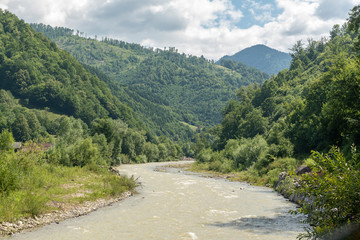Fototapeta na wymiar Landscape in Vaser Valley, Bucovina, Mocanita Steam Train, Romania