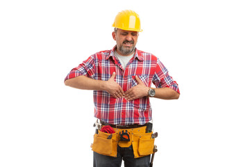 Builder touching diaphragm for stomach pain.
