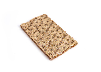 One crunchy wheat rye brown cracker, isolated on white background. Healthy food concept.
