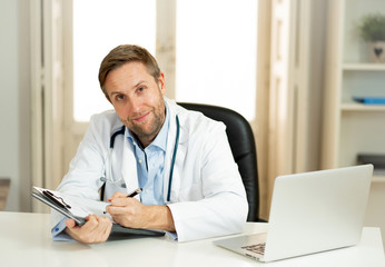 Portrait of successful specialist doctor working in hospital office looking happy and confident