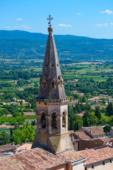 Fototapeta na wymiar Old church dome and valley view in Saint Saturnin Les Apt, France