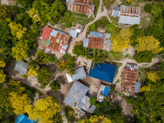 Aerial view of tropical island Malcapuya. Beautiful tropical island with sand beach, palm trees. Palawan, Philippines.