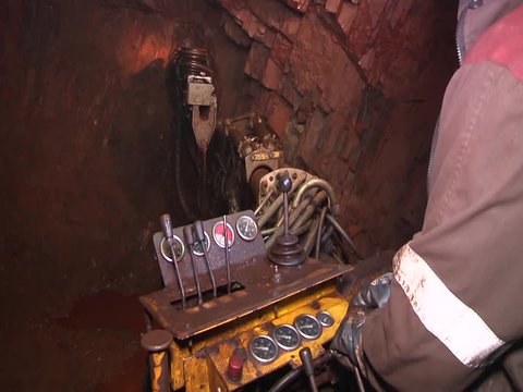 extraction of iron ore in underground mine by drilling machine
