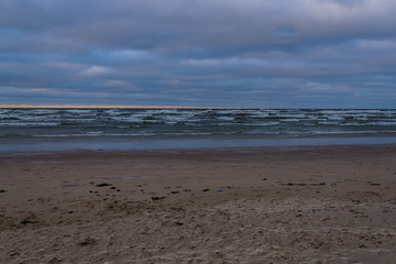 Wind and snow clouds over the Gulf of Riga in December.