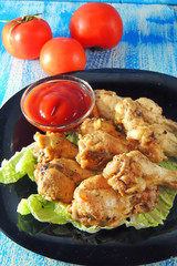 fried wings with sauce