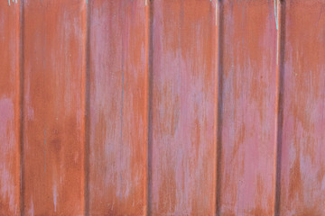 Background from rusty metal. Texture of a rusty fence. Element rusty metal fence.