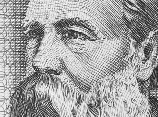 Friedrich Engels on East German banknote closeup macro. Famous socialist philosopher, communist,...