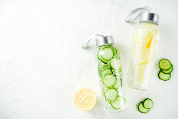 Organic summer cold refreshing drink, detox infused water, with lemon fruit and cucumber...