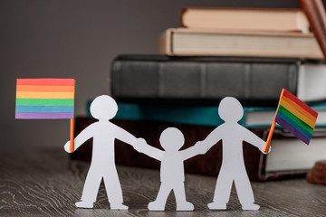 Happy gay couple with child